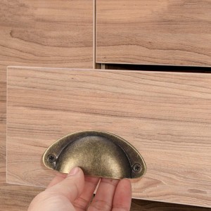 Lot de 16 Poignées de meuble forme coquille couleur bronze Lot de 16 Poignées de meuble forme coquille couleur bronze